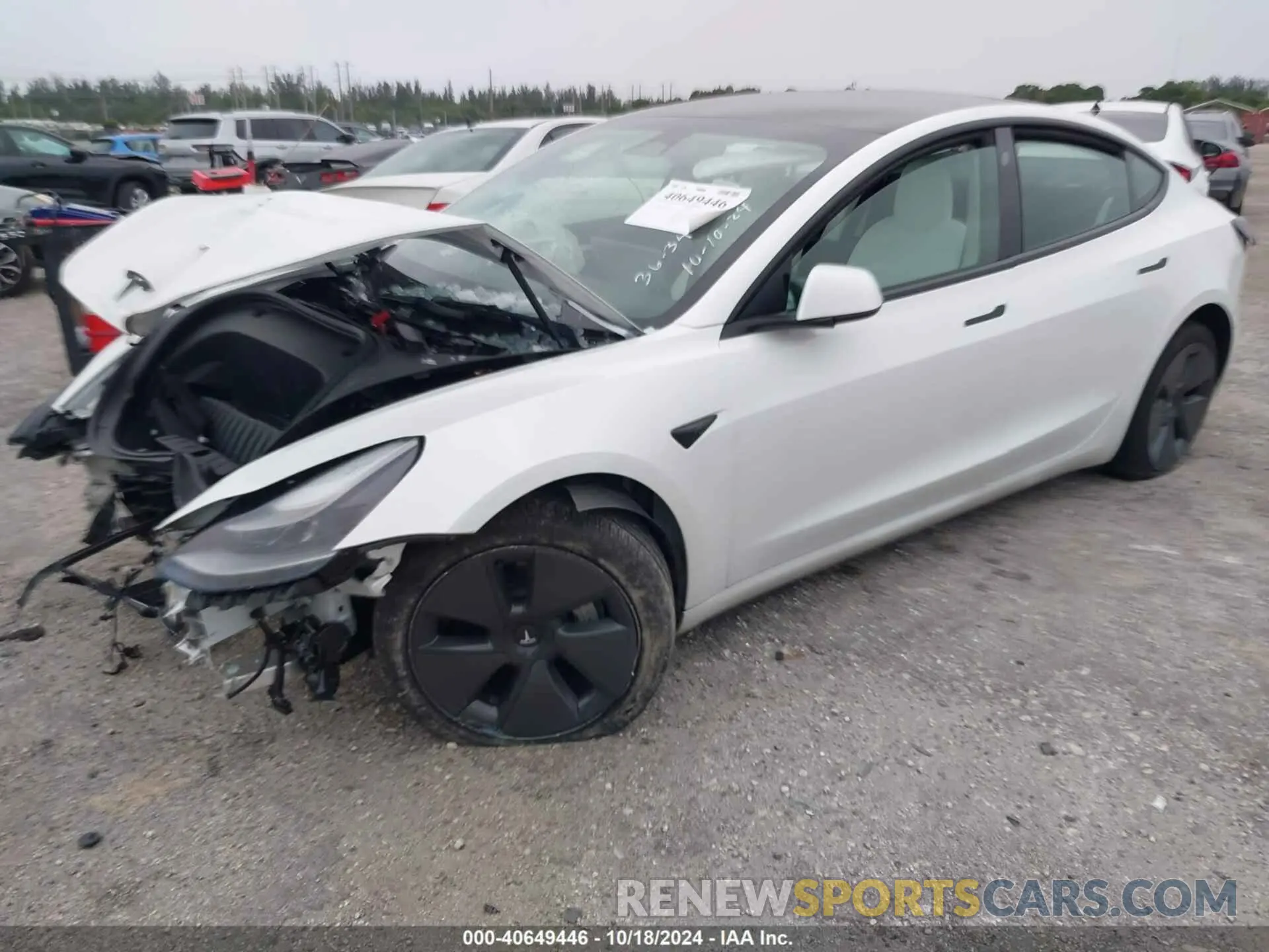 2 fotografías del automóvil dañado 5YJ3E1EA0PF383634 TESLA MODEL 3 2023