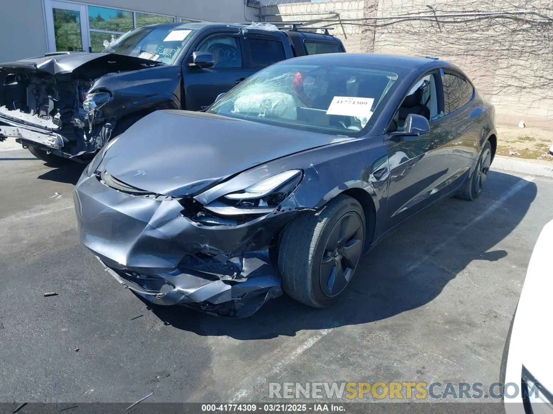 2 fotografías del automóvil dañado 5YJ3E1EA0PF408774 TESLA MODEL 3 2023