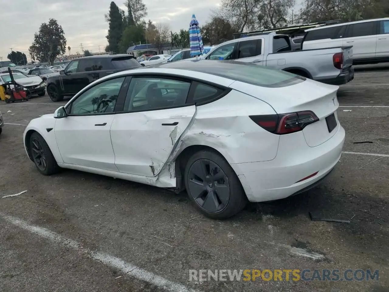 2 fotografías del automóvil dañado 5YJ3E1EA0PF450605 TESLA MODEL 3 2023