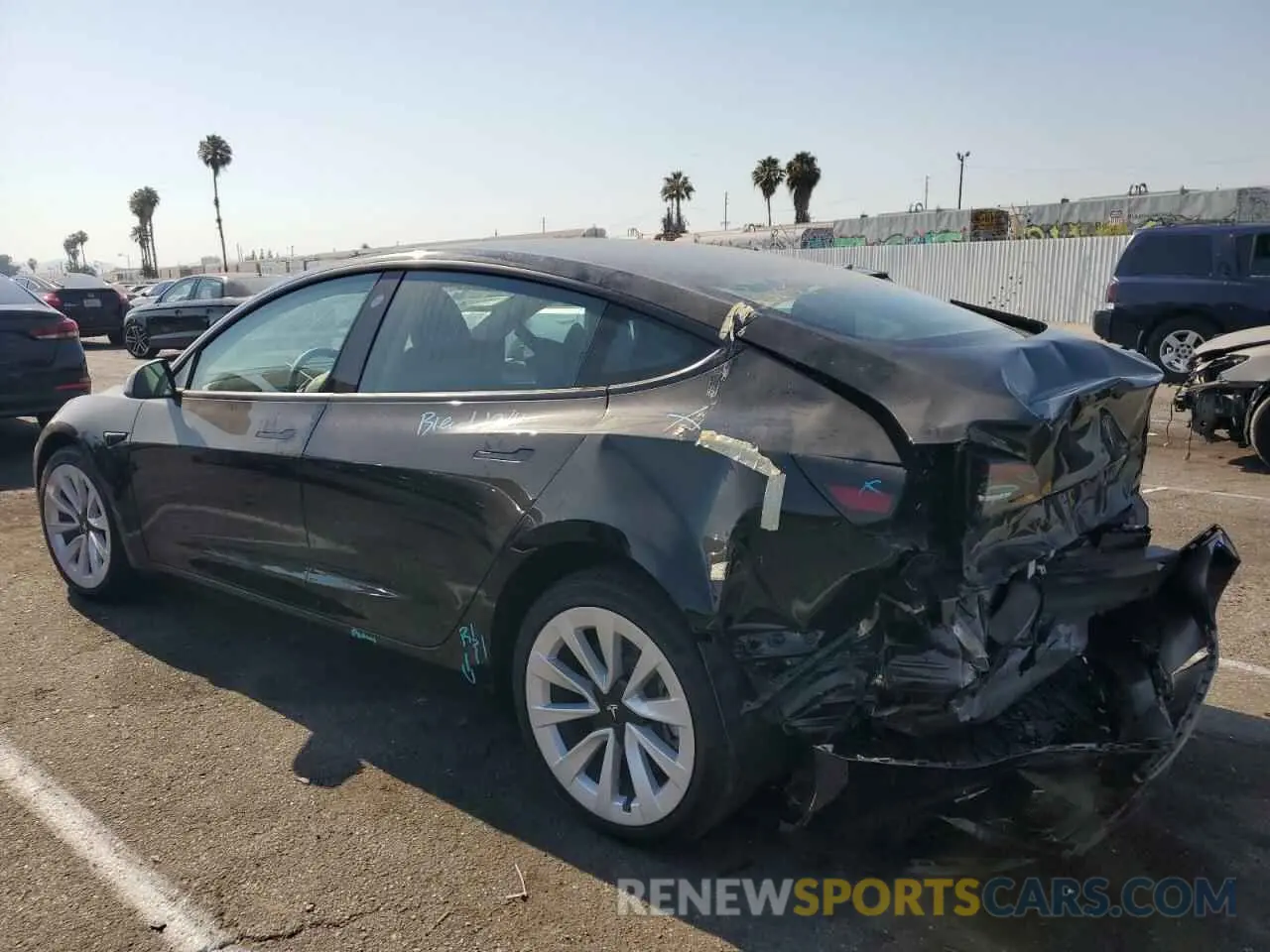 2 fotografías del automóvil dañado 5YJ3E1EA0PF585020 TESLA MODEL 3 2023