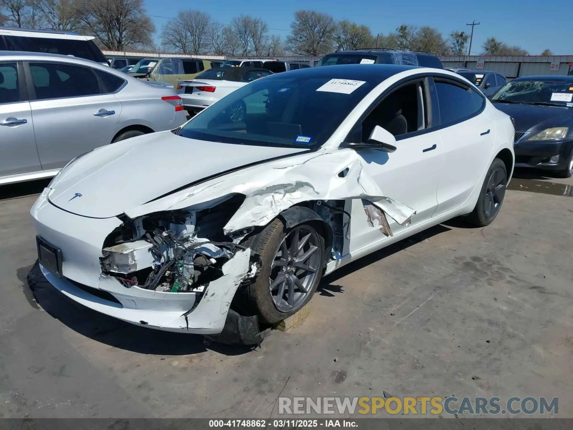 2 fotografías del automóvil dañado 5YJ3E1EA0PF608506 TESLA MODEL 3 2023