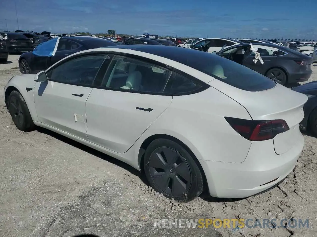 2 fotografías del automóvil dañado 5YJ3E1EA0PF653560 TESLA MODEL 3 2023