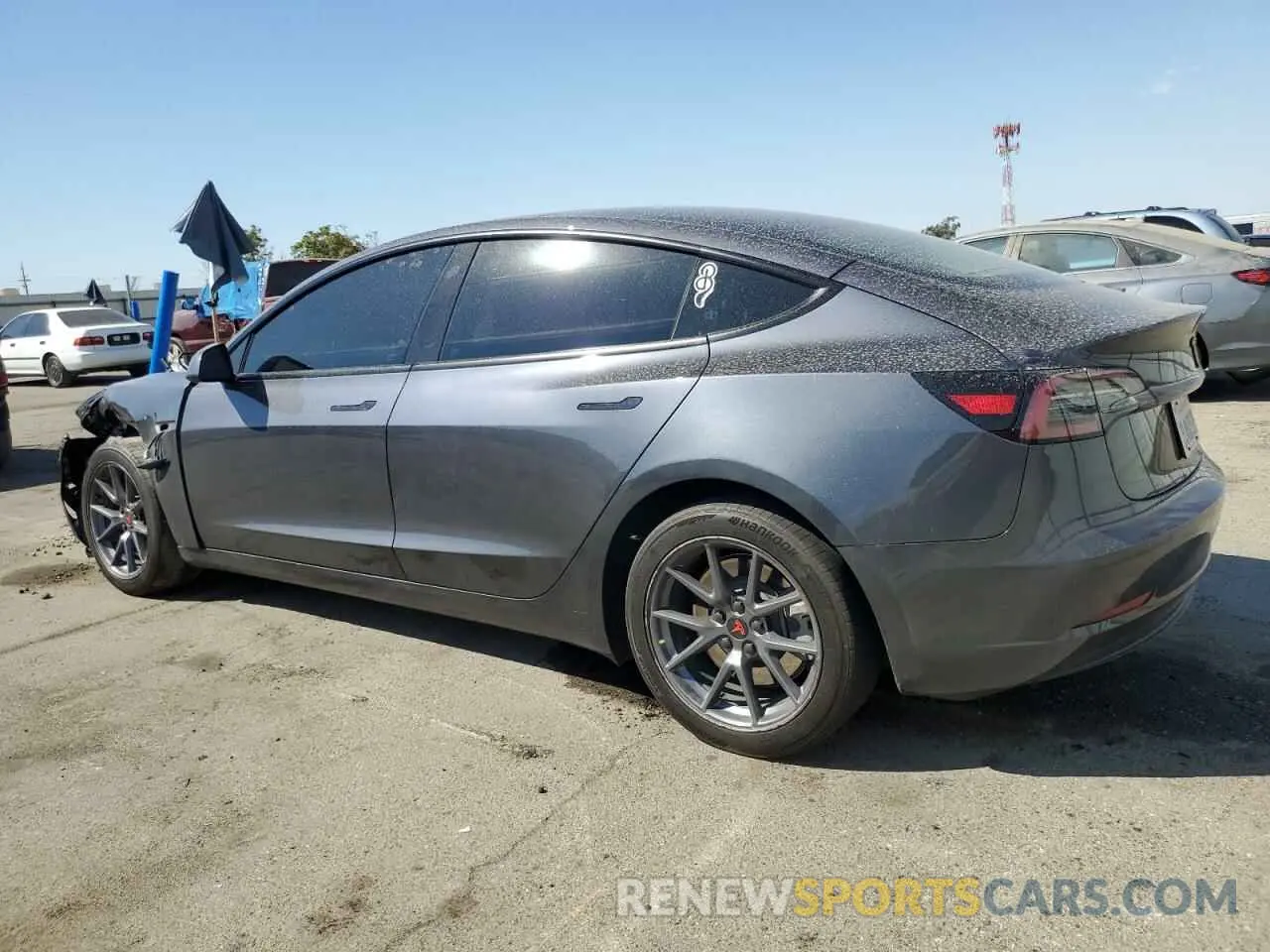 2 fotografías del automóvil dañado 5YJ3E1EA0PF687367 TESLA MODEL 3 2023