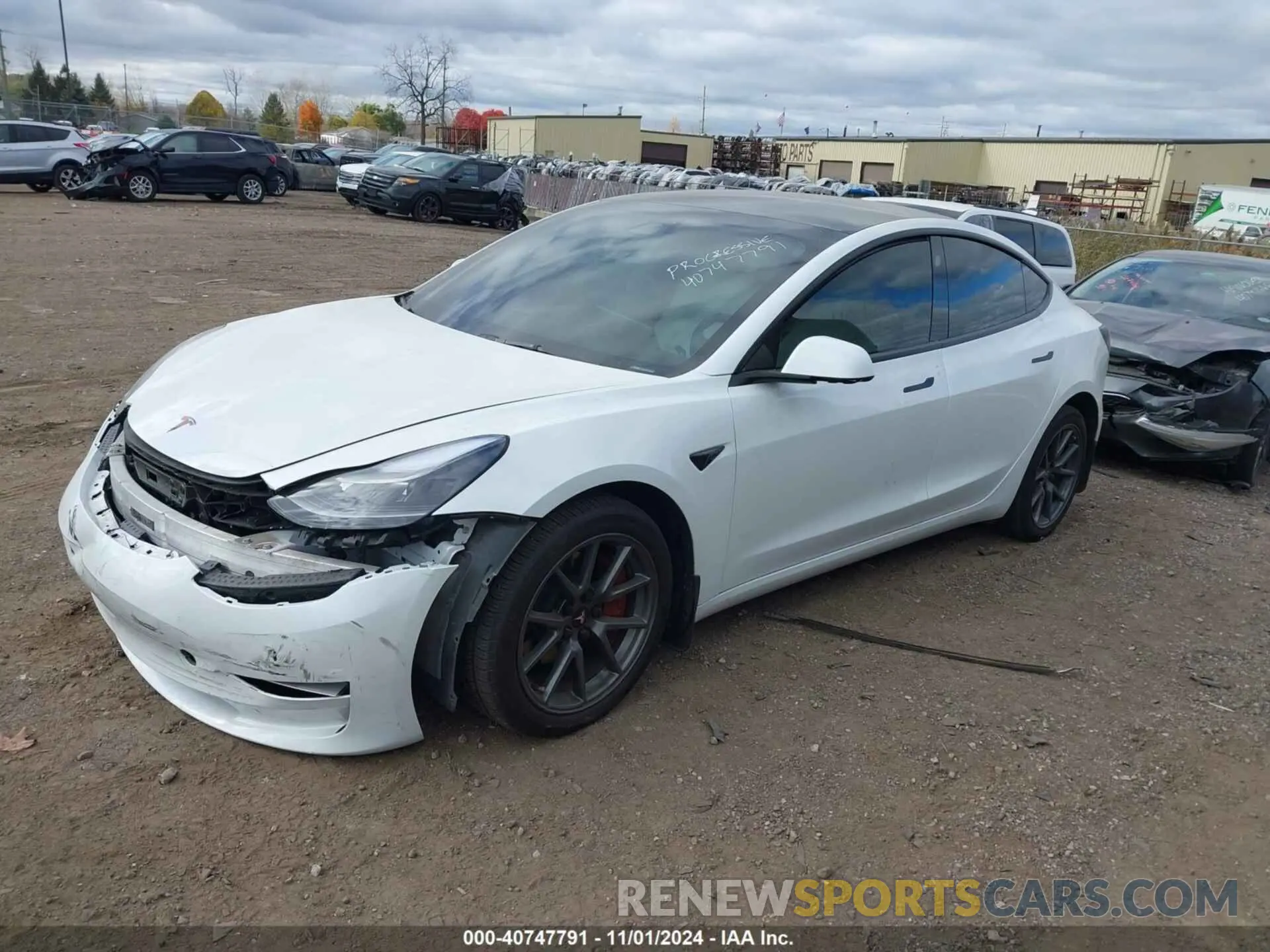 2 fotografías del automóvil dañado 5YJ3E1EA1PF384890 TESLA MODEL 3 2023