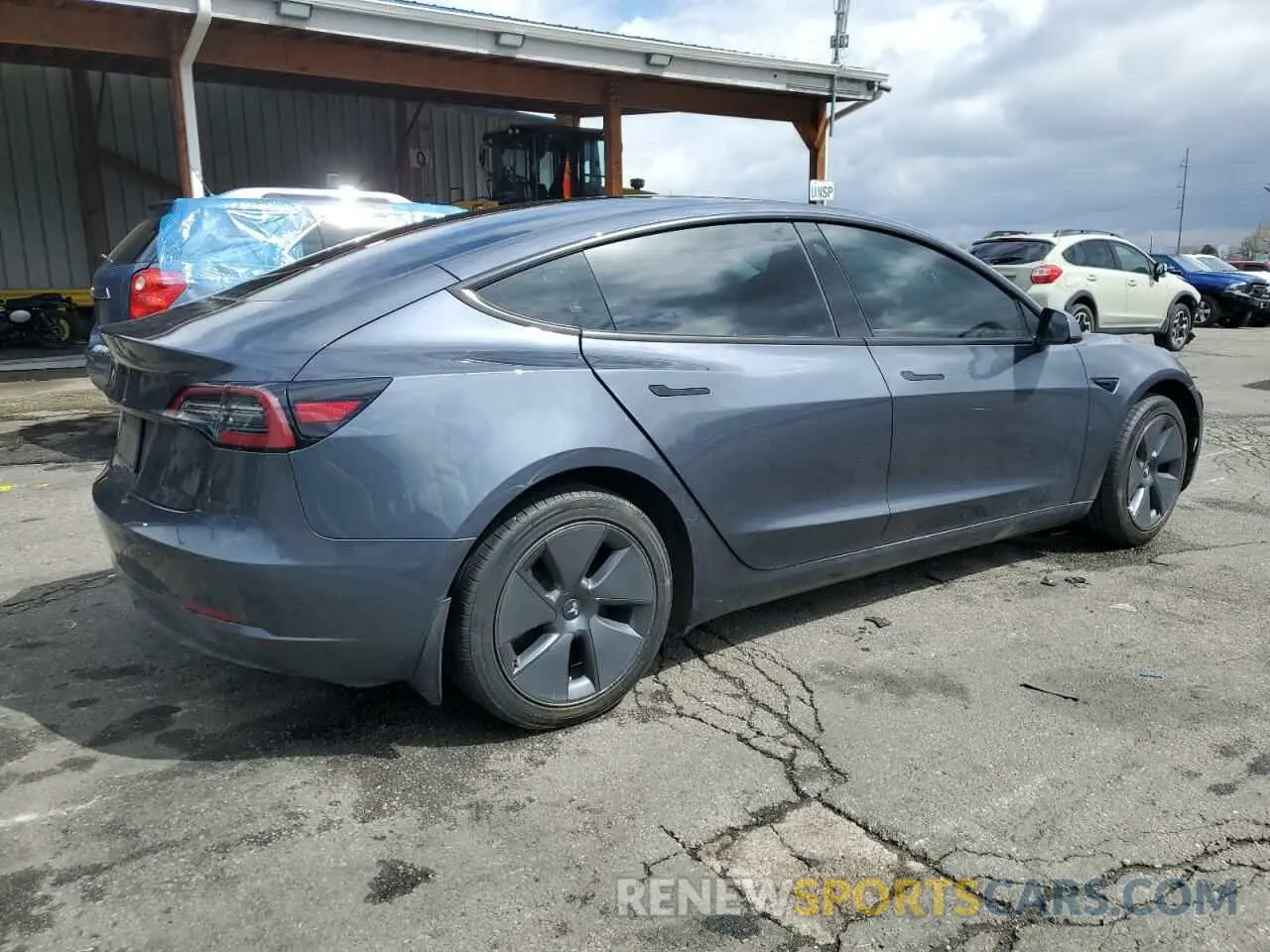 3 fotografías del automóvil dañado 5YJ3E1EA1PF400490 TESLA MODEL 3 2023