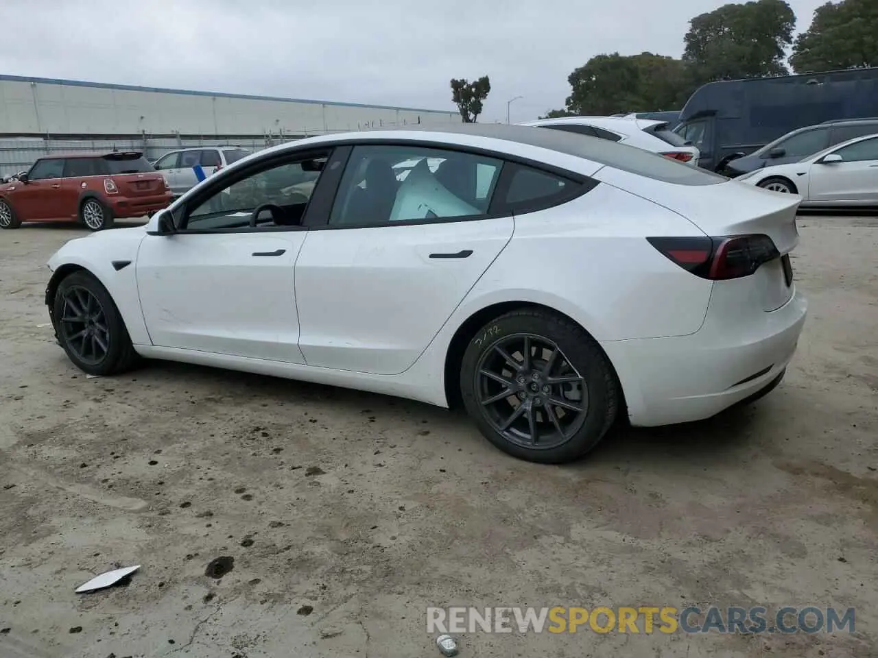 2 fotografías del automóvil dañado 5YJ3E1EA1PF513310 TESLA MODEL 3 2023