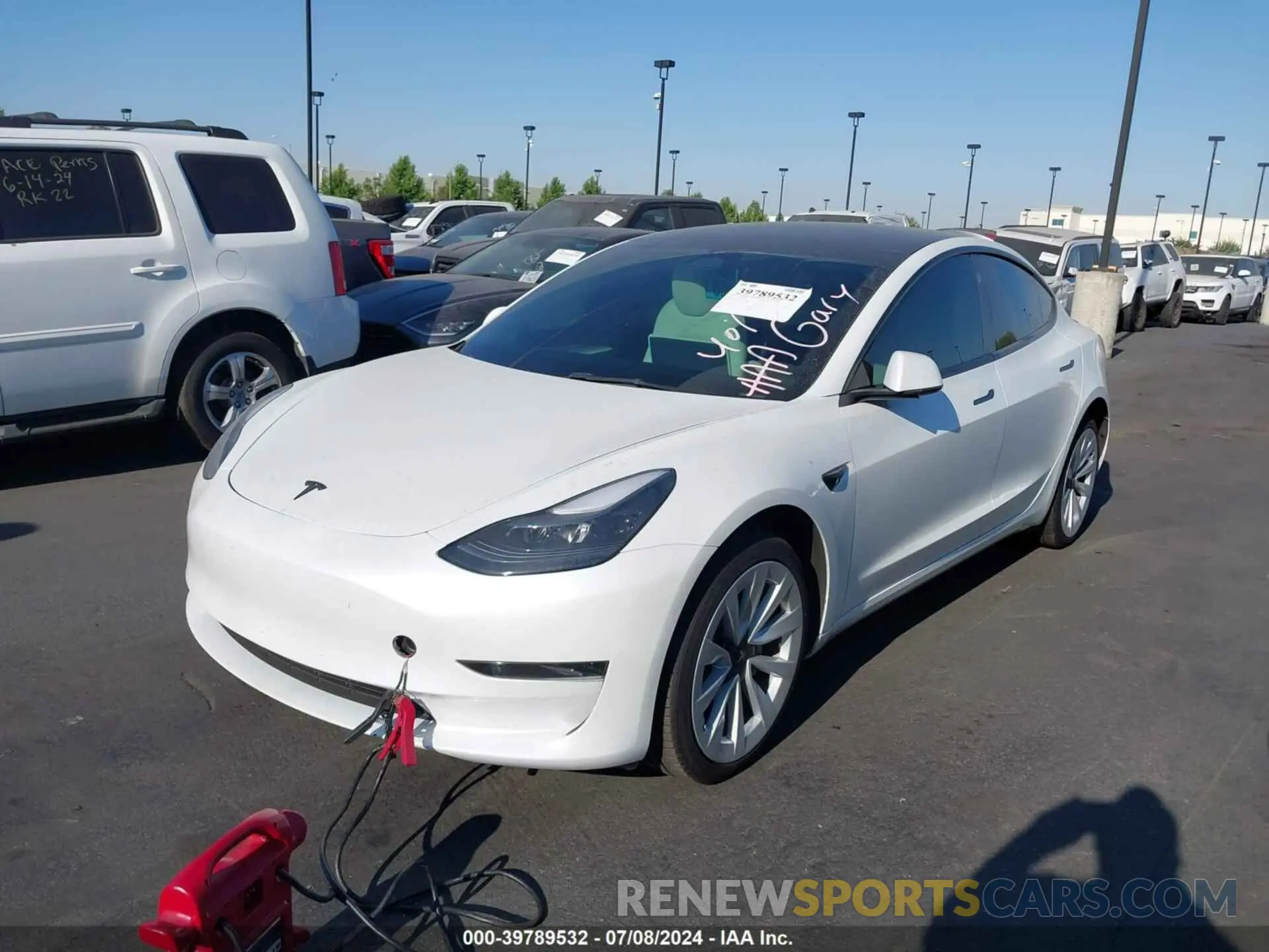 2 fotografías del automóvil dañado 5YJ3E1EA1PF513405 TESLA MODEL 3 2023