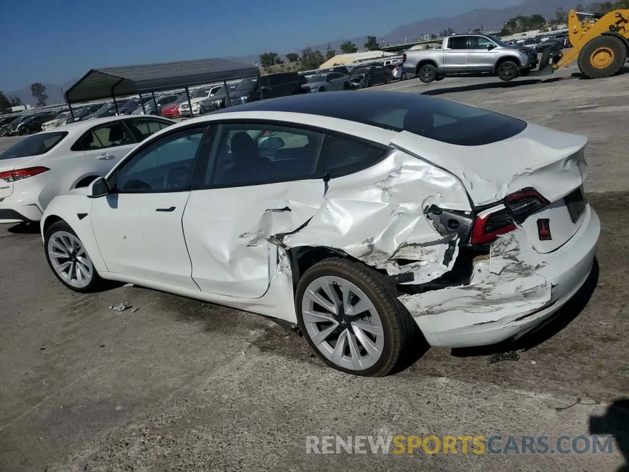 2 fotografías del automóvil dañado 5YJ3E1EA1PF546534 TESLA MODEL 3 2023
