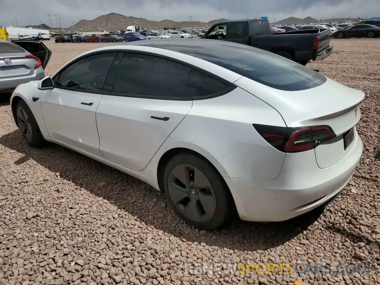 2 fotografías del automóvil dañado 5YJ3E1EA1PF587889 TESLA MODEL 3 2023