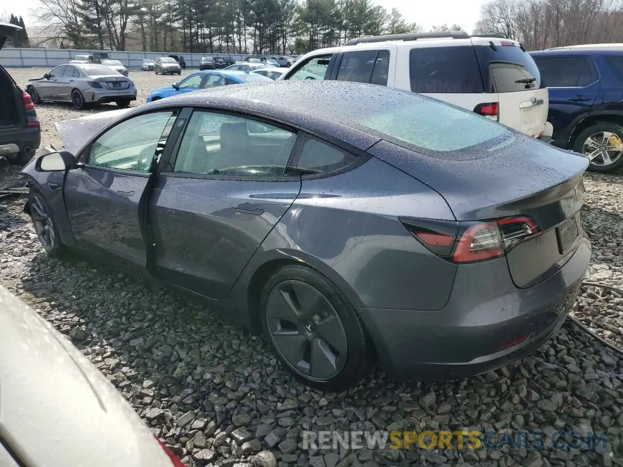 2 fotografías del automóvil dañado 5YJ3E1EA1PF644544 TESLA MODEL 3 2023
