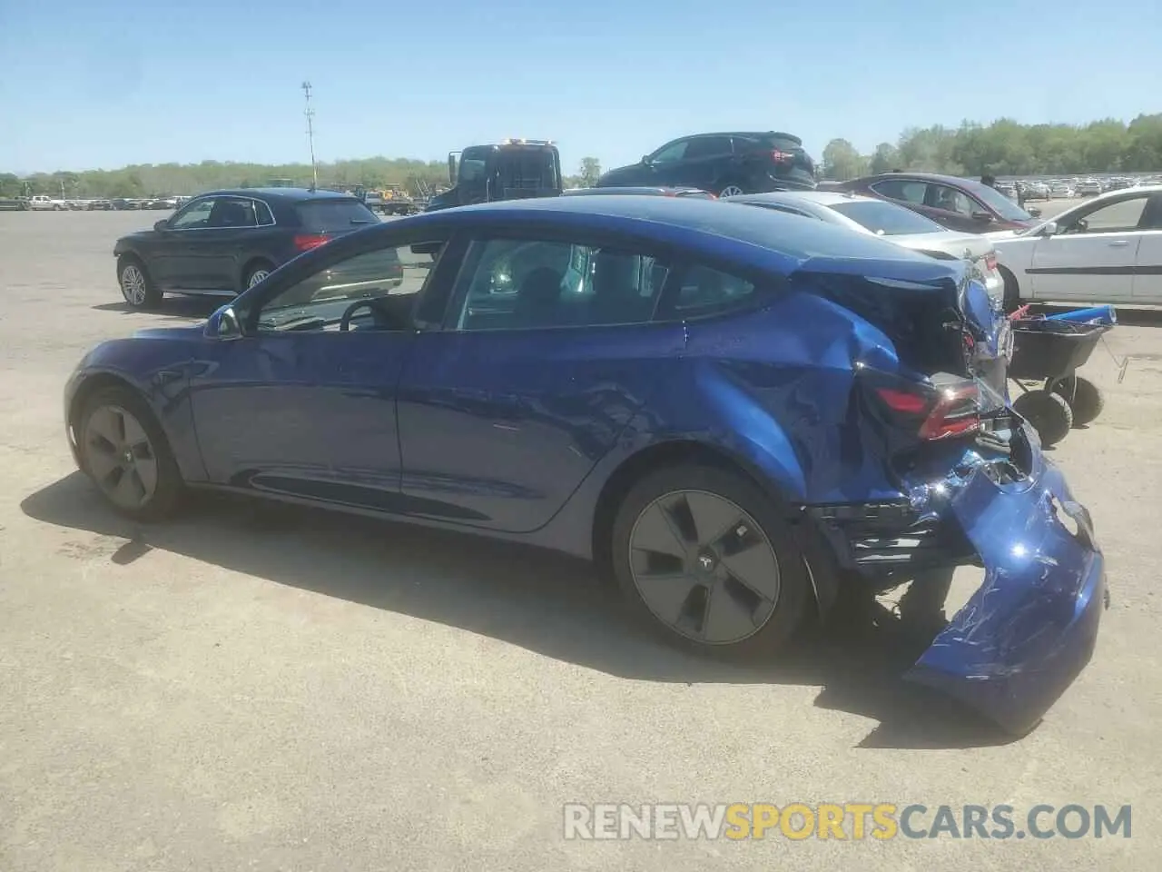 2 fotografías del automóvil dañado 5YJ3E1EA1PF646455 TESLA MODEL 3 2023