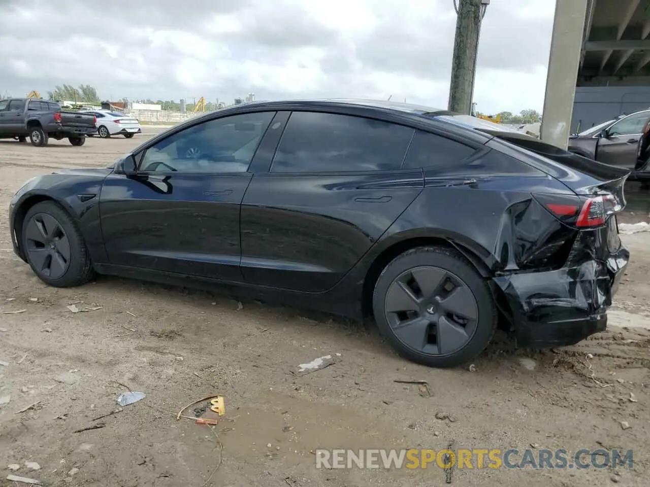 2 fotografías del automóvil dañado 5YJ3E1EA1PF676801 TESLA MODEL 3 2023