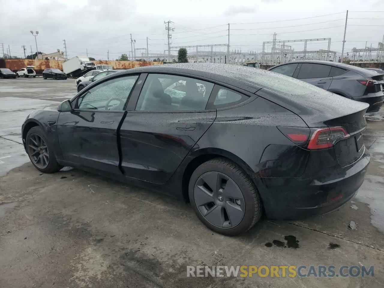 2 fotografías del automóvil dañado 5YJ3E1EA1PF677592 TESLA MODEL 3 2023