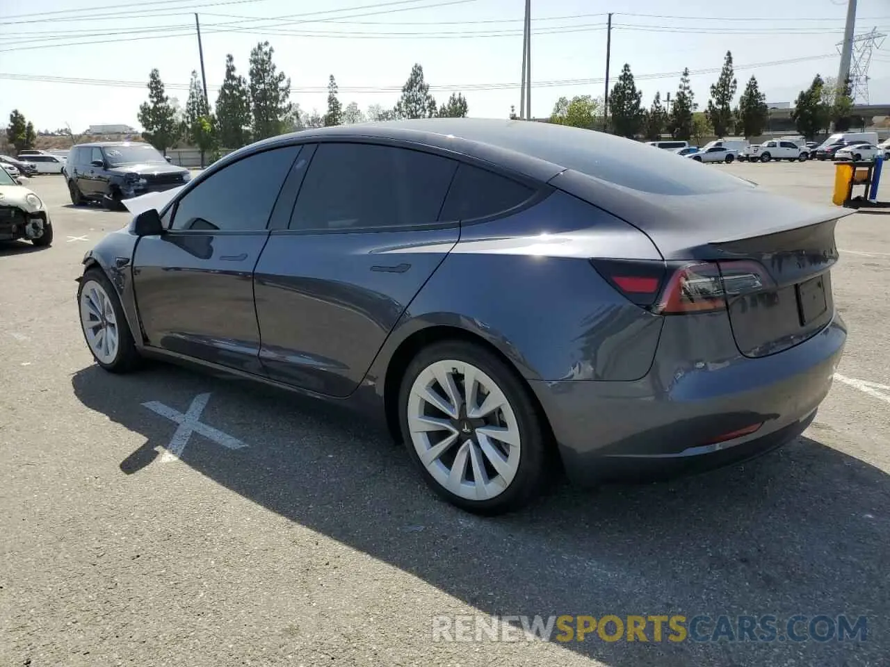 2 fotografías del automóvil dañado 5YJ3E1EA1PF701664 TESLA MODEL 3 2023