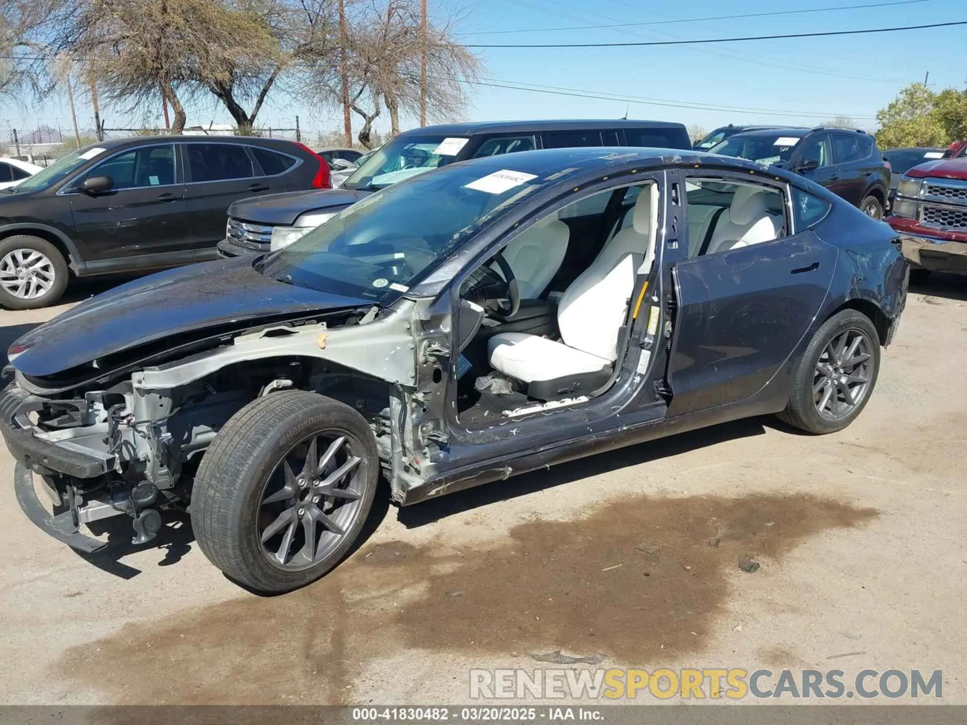 2 fotografías del automóvil dañado 5YJ3E1EA1PF711921 TESLA MODEL 3 2023