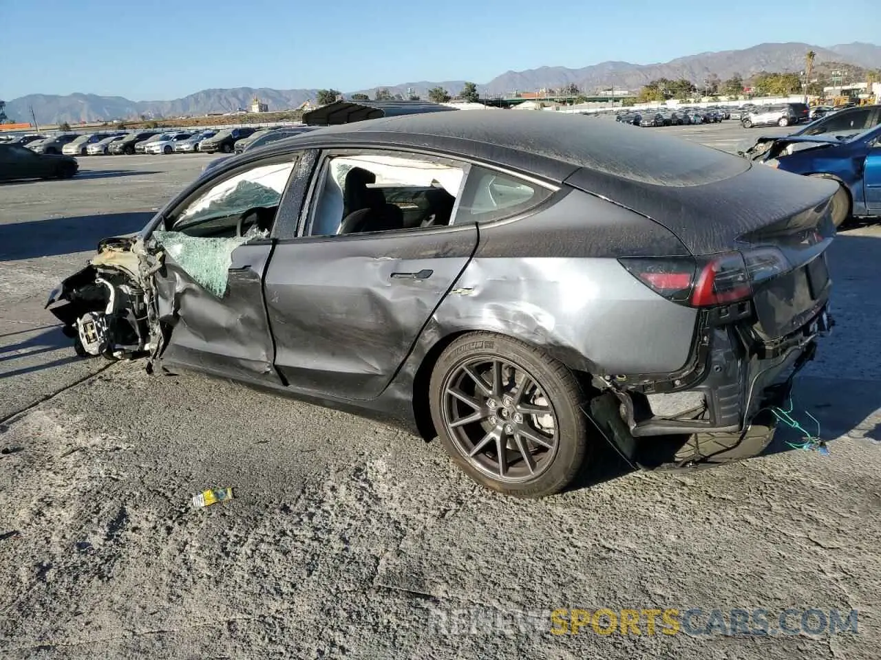 2 fotografías del automóvil dañado 5YJ3E1EA1PF713345 TESLA MODEL 3 2023