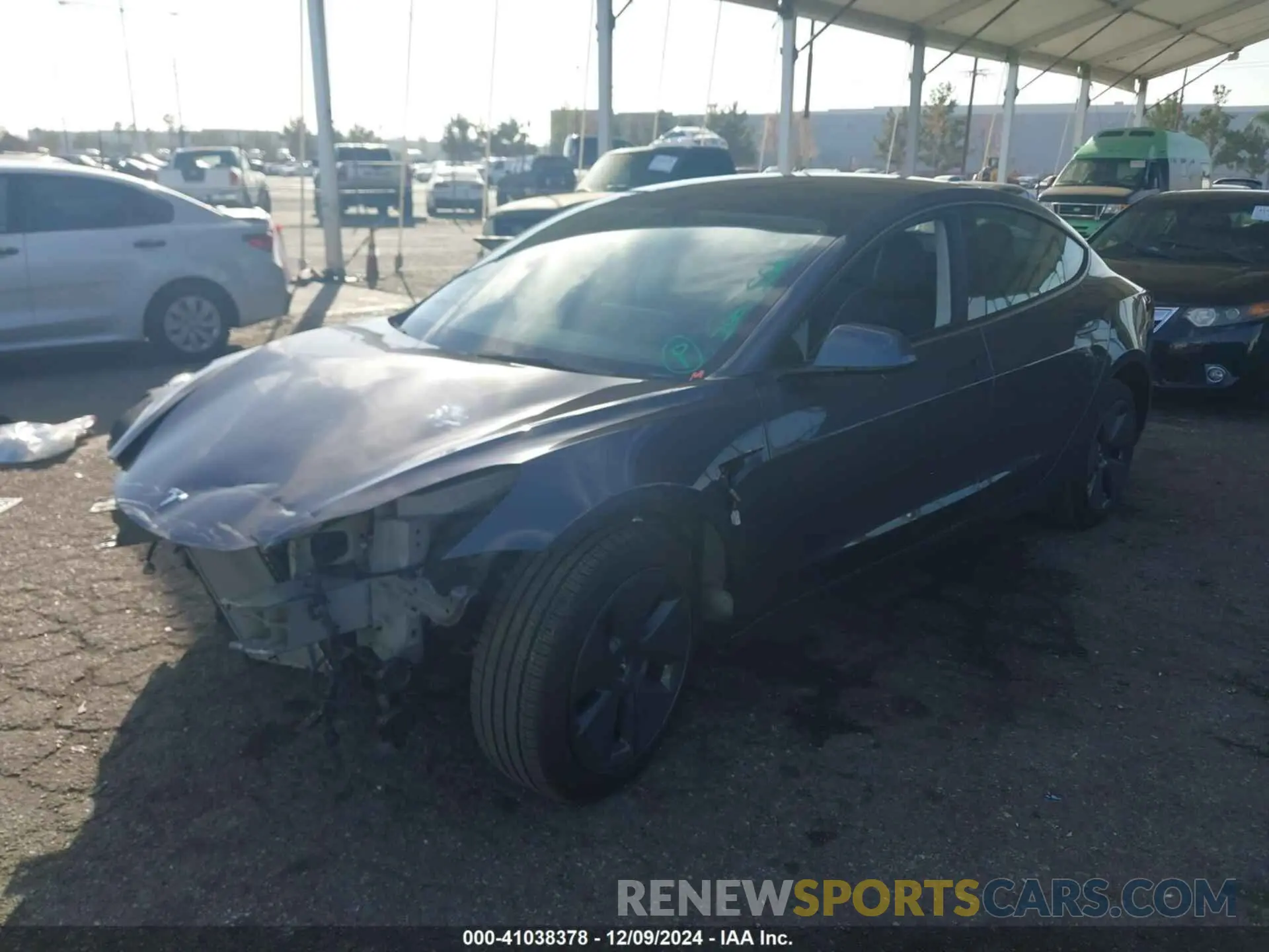 2 fotografías del automóvil dañado 5YJ3E1EA2PF406542 TESLA MODEL 3 2023
