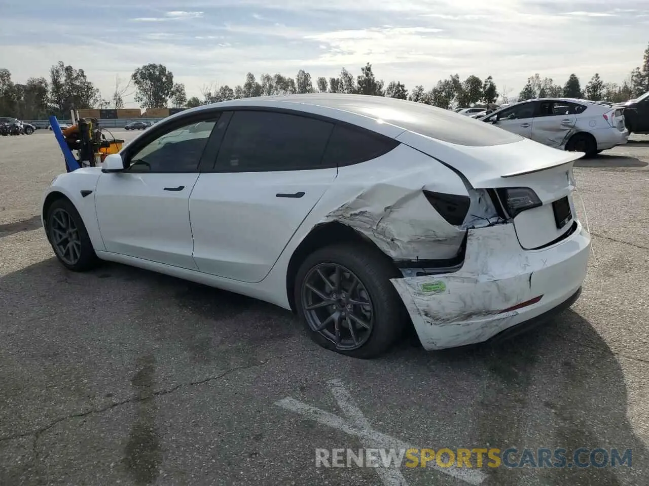 2 fotografías del automóvil dañado 5YJ3E1EA2PF429917 TESLA MODEL 3 2023