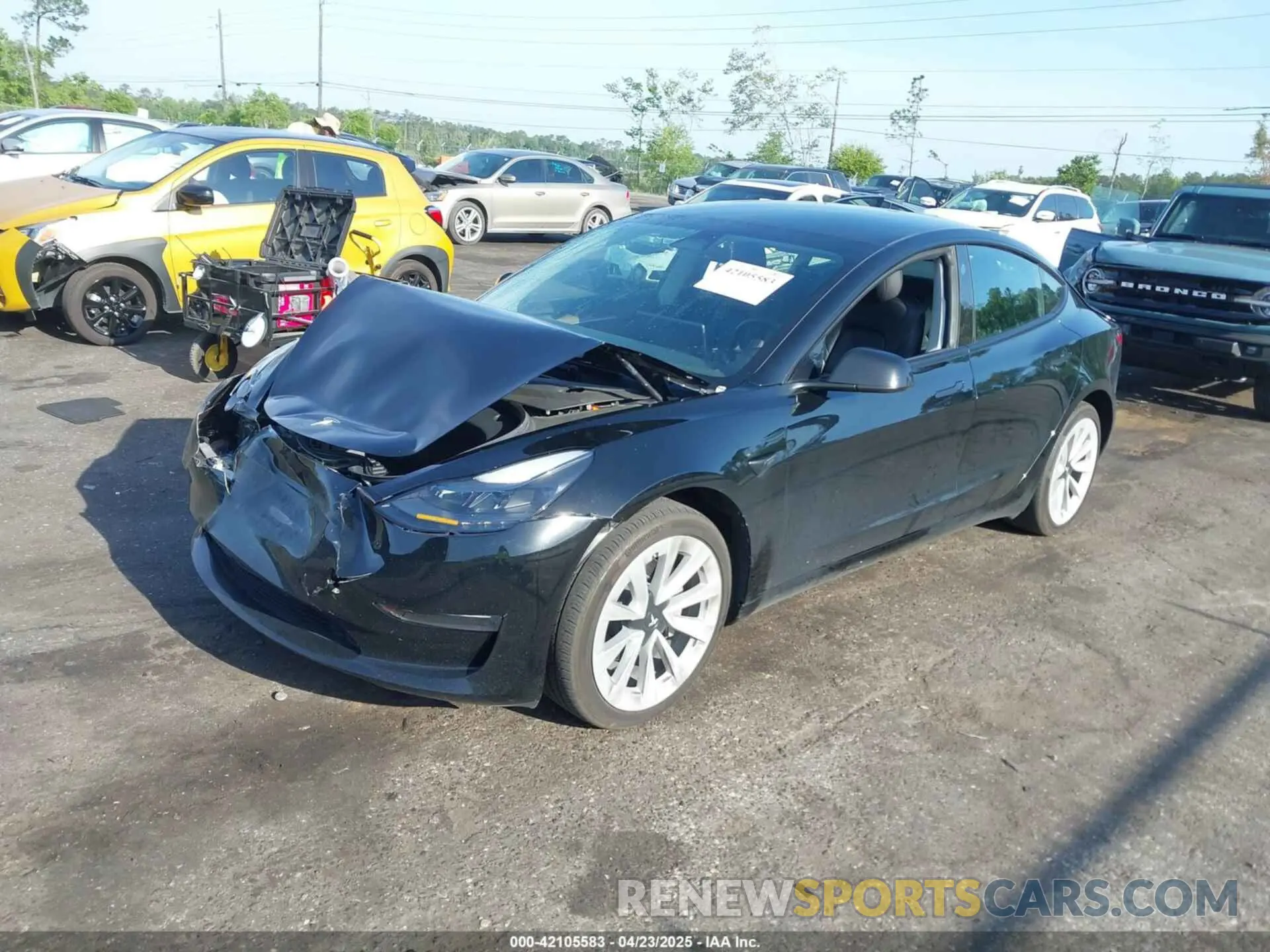 2 fotografías del automóvil dañado 5YJ3E1EA2PF437967 TESLA MODEL 3 2023