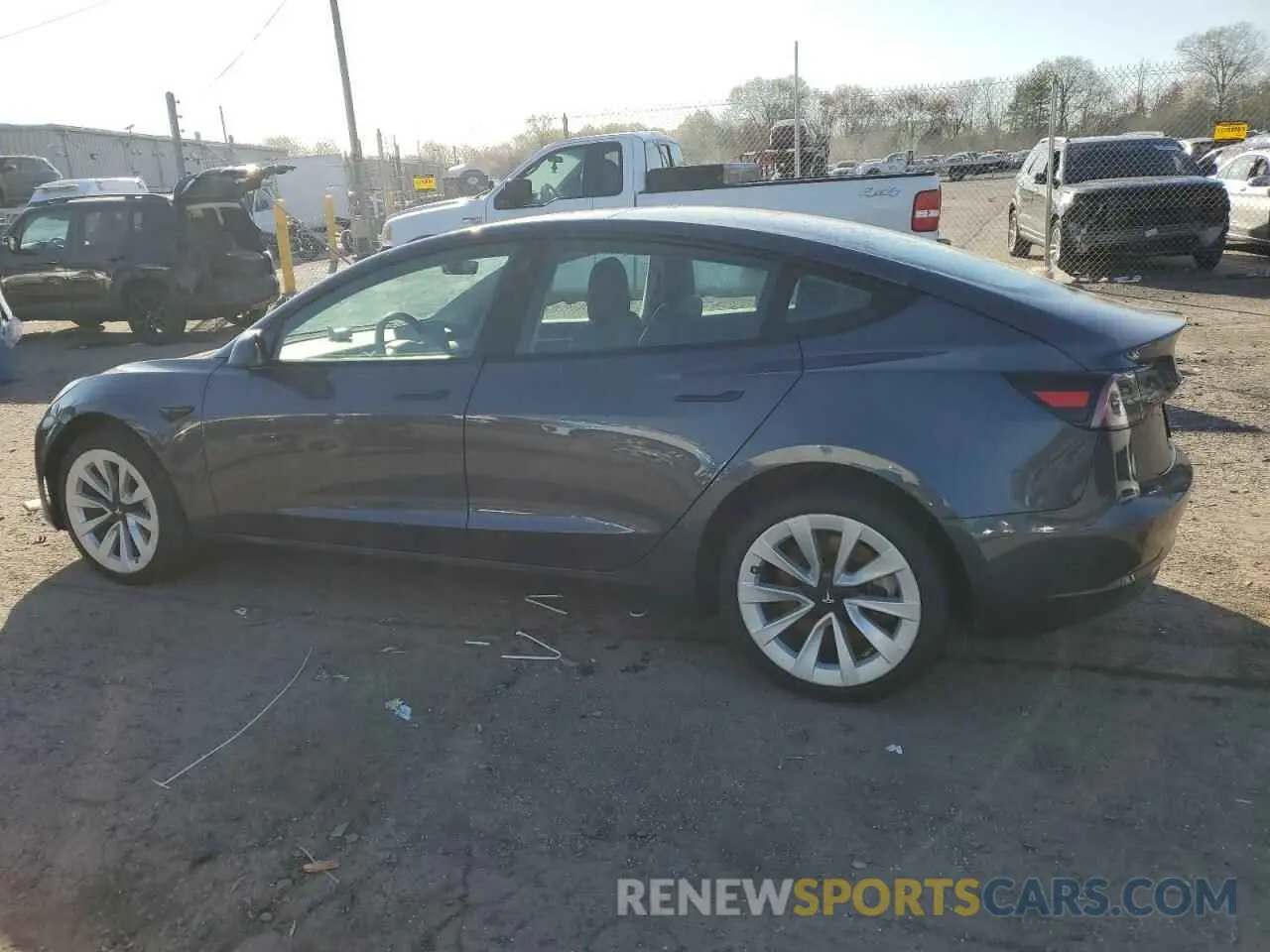 2 fotografías del automóvil dañado 5YJ3E1EA2PF447477 TESLA MODEL 3 2023