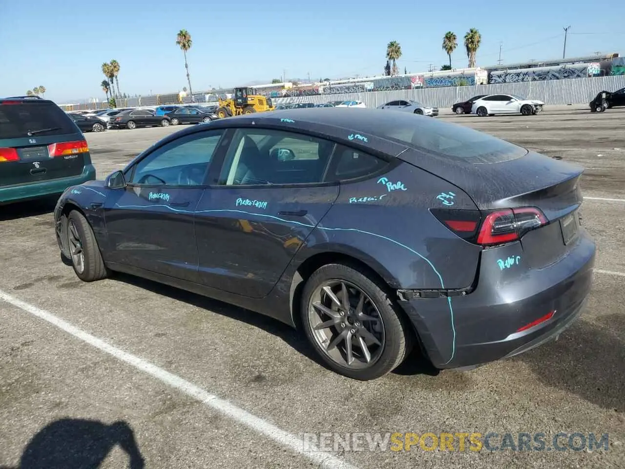 2 fotografías del automóvil dañado 5YJ3E1EA2PF448029 TESLA MODEL 3 2023