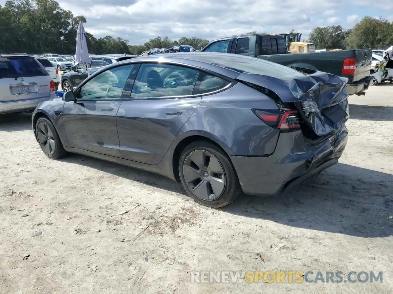 2 fotografías del automóvil dañado 5YJ3E1EA2PF457233 TESLA MODEL 3 2023