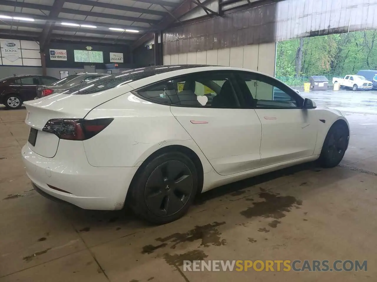 3 fotografías del automóvil dañado 5YJ3E1EA2PF460536 TESLA MODEL 3 2023