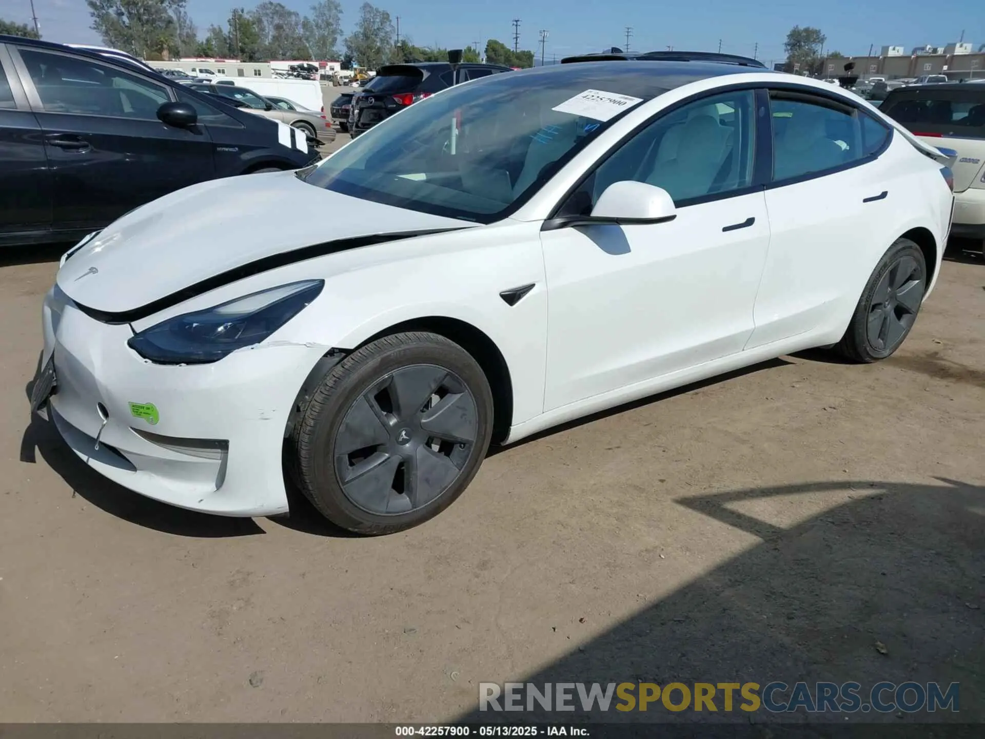 2 fotografías del automóvil dañado 5YJ3E1EA2PF465882 TESLA MODEL 3 2023