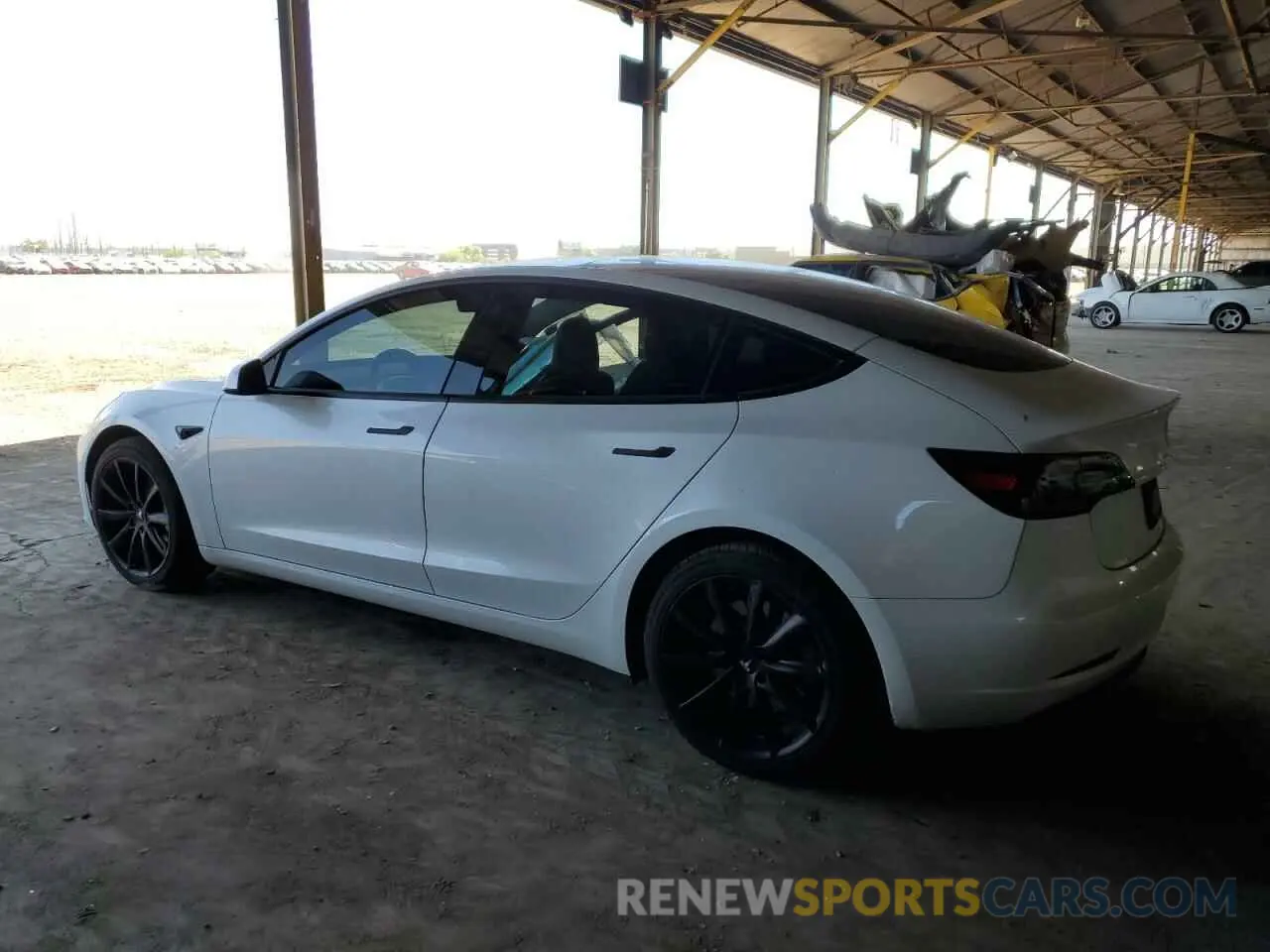 2 fotografías del automóvil dañado 5YJ3E1EA2PF471049 TESLA MODEL 3 2023