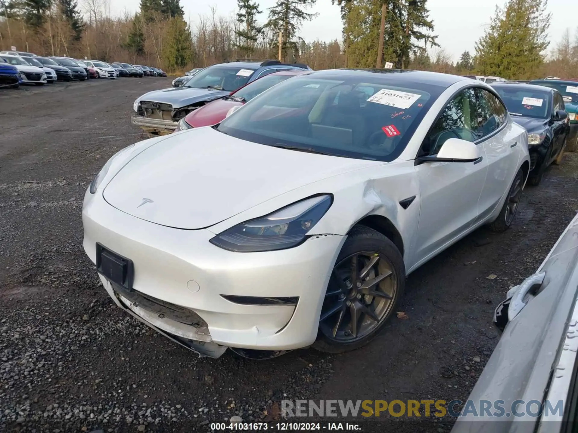 2 fotografías del automóvil dañado 5YJ3E1EA2PF474243 TESLA MODEL 3 2023