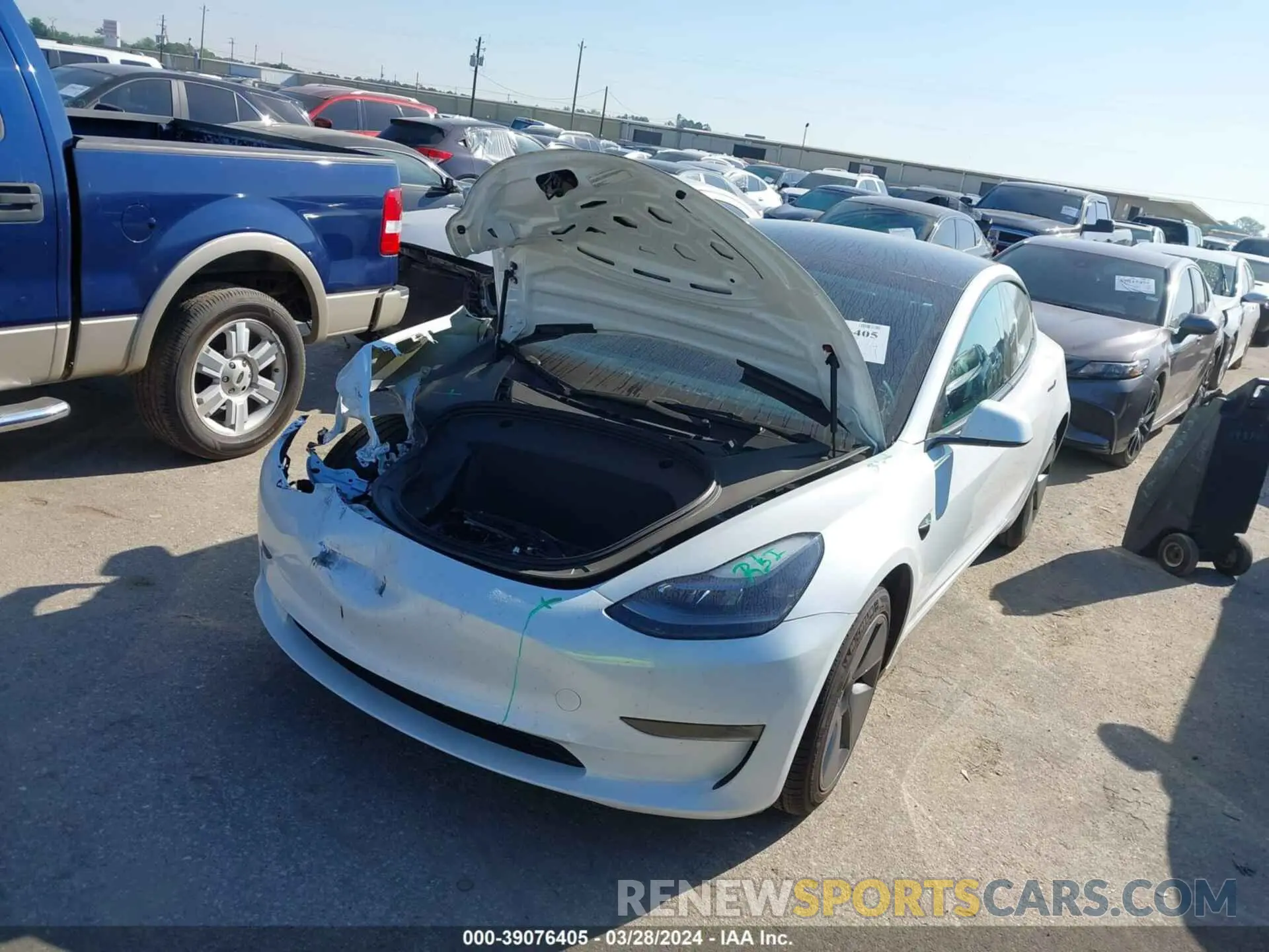 2 fotografías del automóvil dañado 5YJ3E1EA2PF492239 TESLA MODEL 3 2023