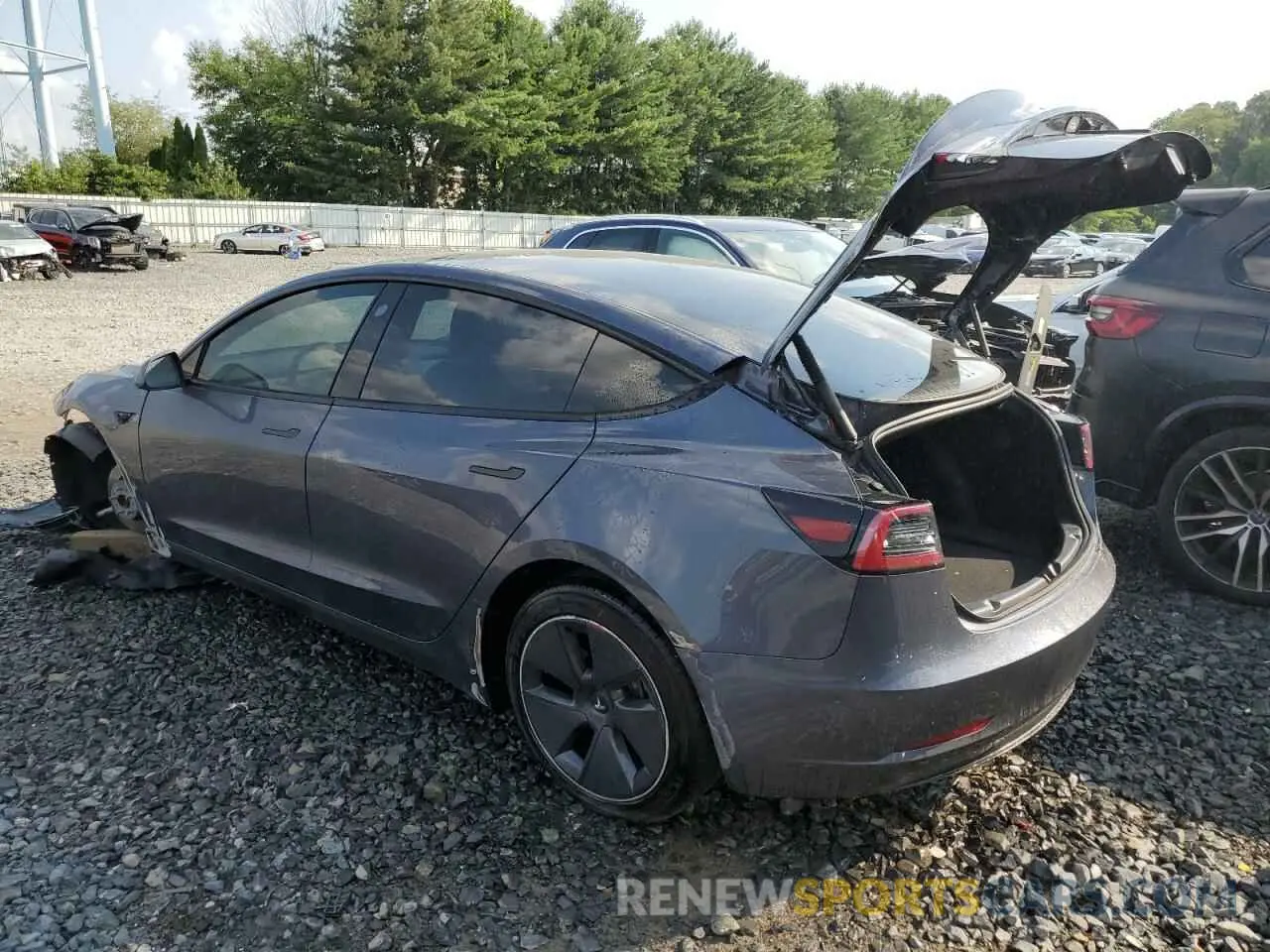 2 fotografías del automóvil dañado 5YJ3E1EA2PF544386 TESLA MODEL 3 2023