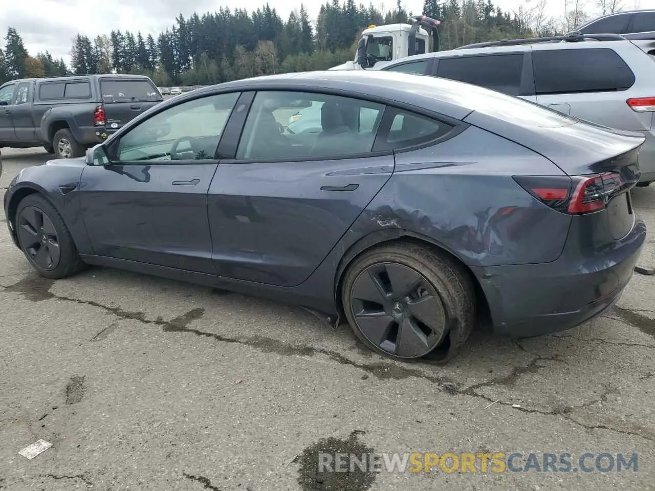 2 fotografías del automóvil dañado 5YJ3E1EA2PF583219 TESLA MODEL 3 2023