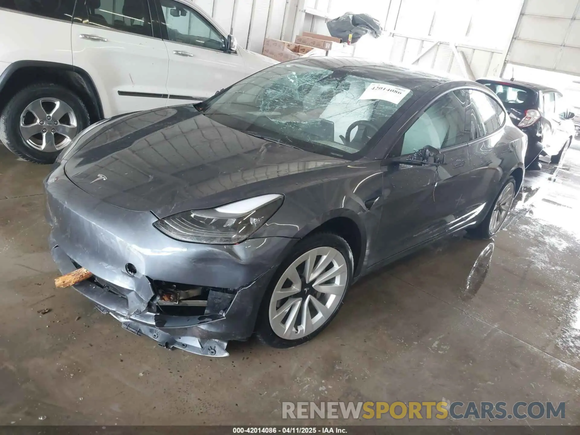 2 fotografías del automóvil dañado 5YJ3E1EA2PF591661 TESLA MODEL 3 2023