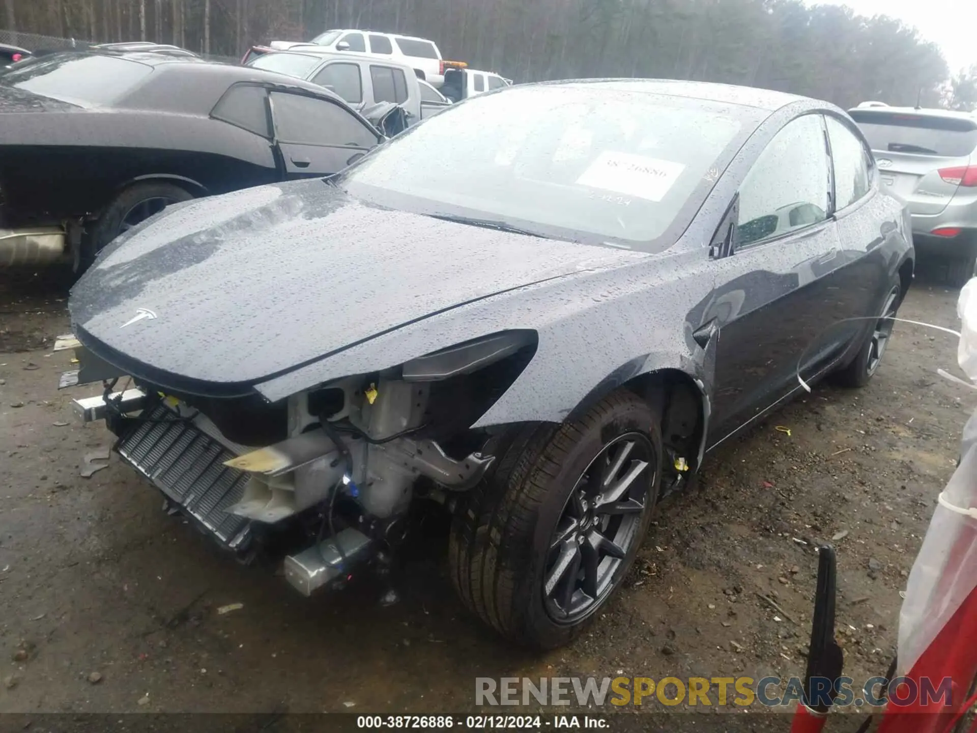2 fotografías del automóvil dañado 5YJ3E1EA2PF685636 TESLA MODEL 3 2023
