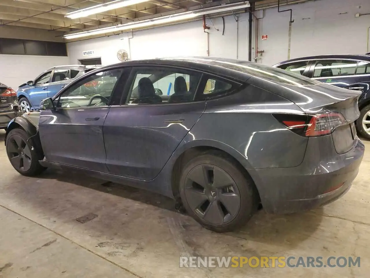 2 fotografías del automóvil dañado 5YJ3E1EA2PF693011 TESLA MODEL 3 2023