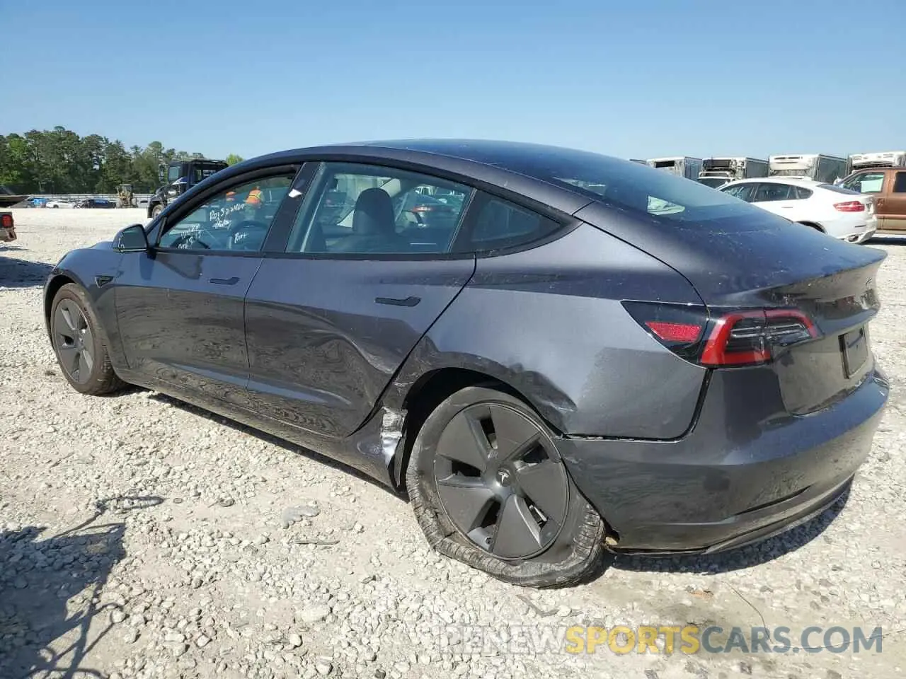 2 fotografías del automóvil dañado 5YJ3E1EA2PF705755 TESLA MODEL 3 2023