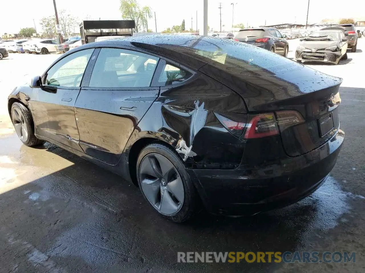 2 fotografías del automóvil dañado 5YJ3E1EA3PF385877 TESLA MODEL 3 2023