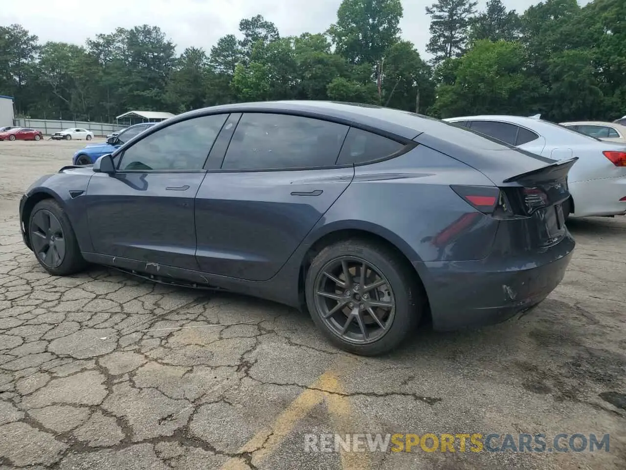 2 fotografías del automóvil dañado 5YJ3E1EA3PF395258 TESLA MODEL 3 2023