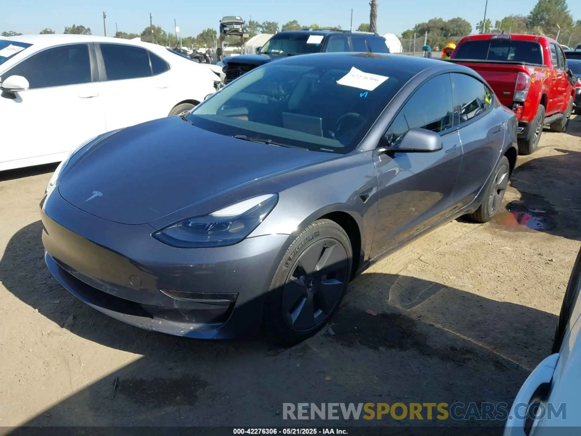2 fotografías del automóvil dañado 5YJ3E1EA3PF412267 TESLA MODEL 3 2023