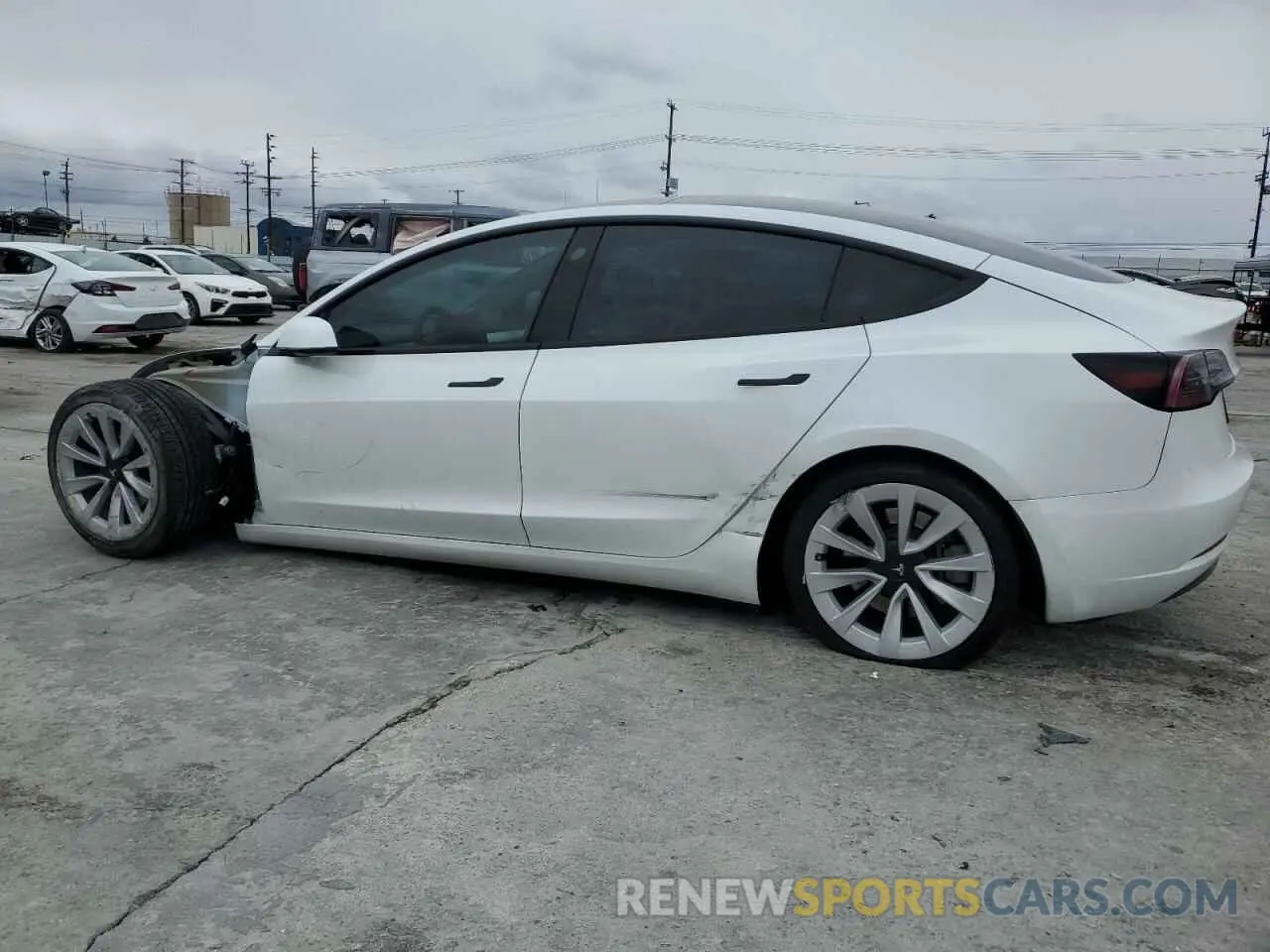 2 fotografías del automóvil dañado 5YJ3E1EA3PF427285 TESLA MODEL 3 2023
