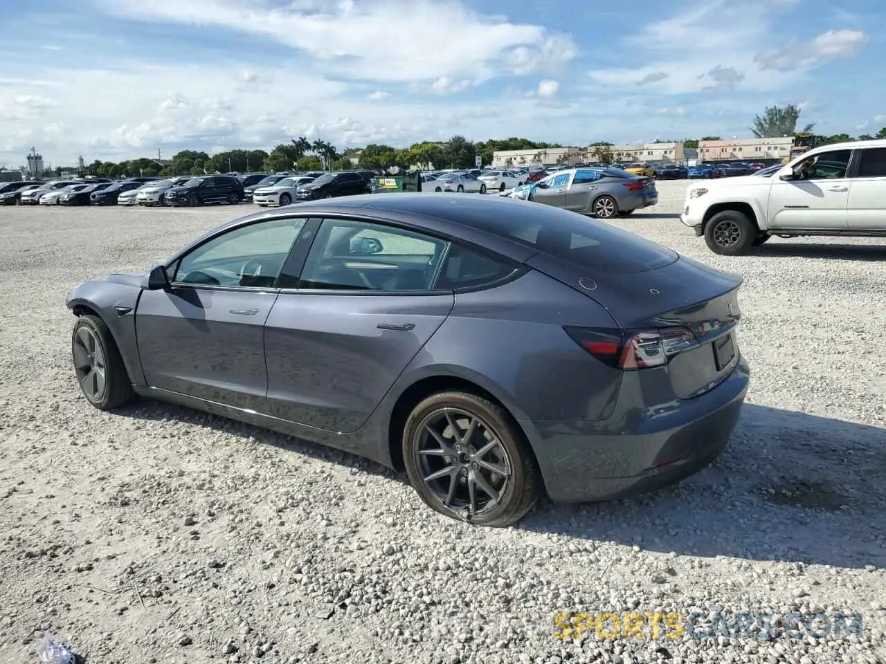 2 fotografías del automóvil dañado 5YJ3E1EA3PF428226 TESLA MODEL 3 2023