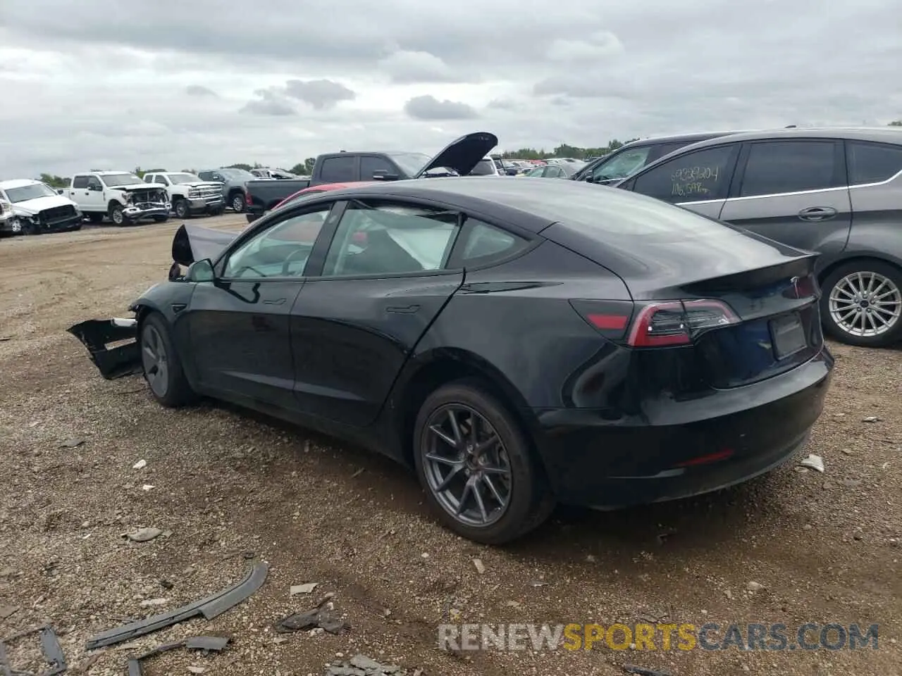 2 fotografías del automóvil dañado 5YJ3E1EA3PF434012 TESLA MODEL 3 2023