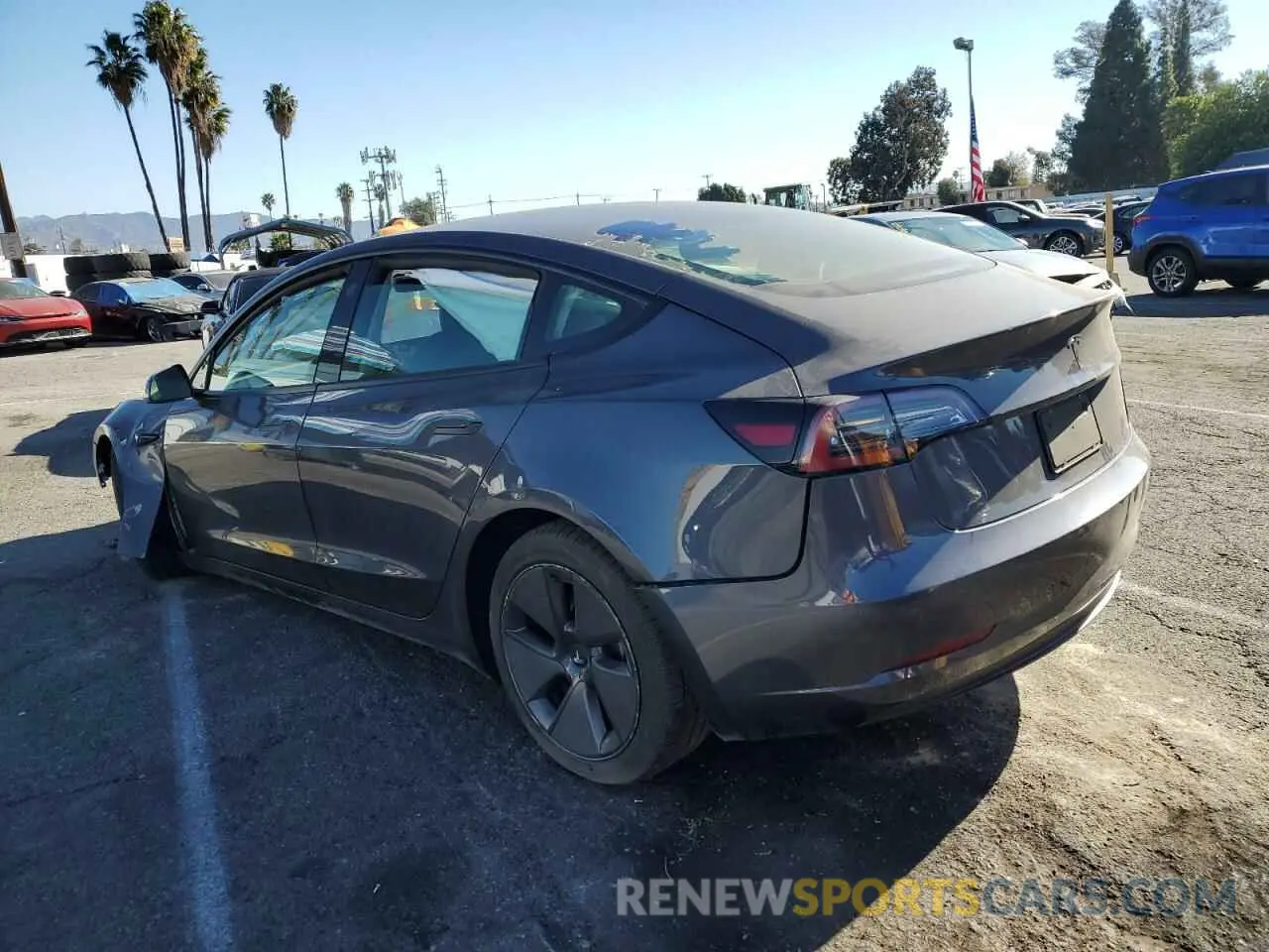 2 fotografías del automóvil dañado 5YJ3E1EA3PF447004 TESLA MODEL 3 2023