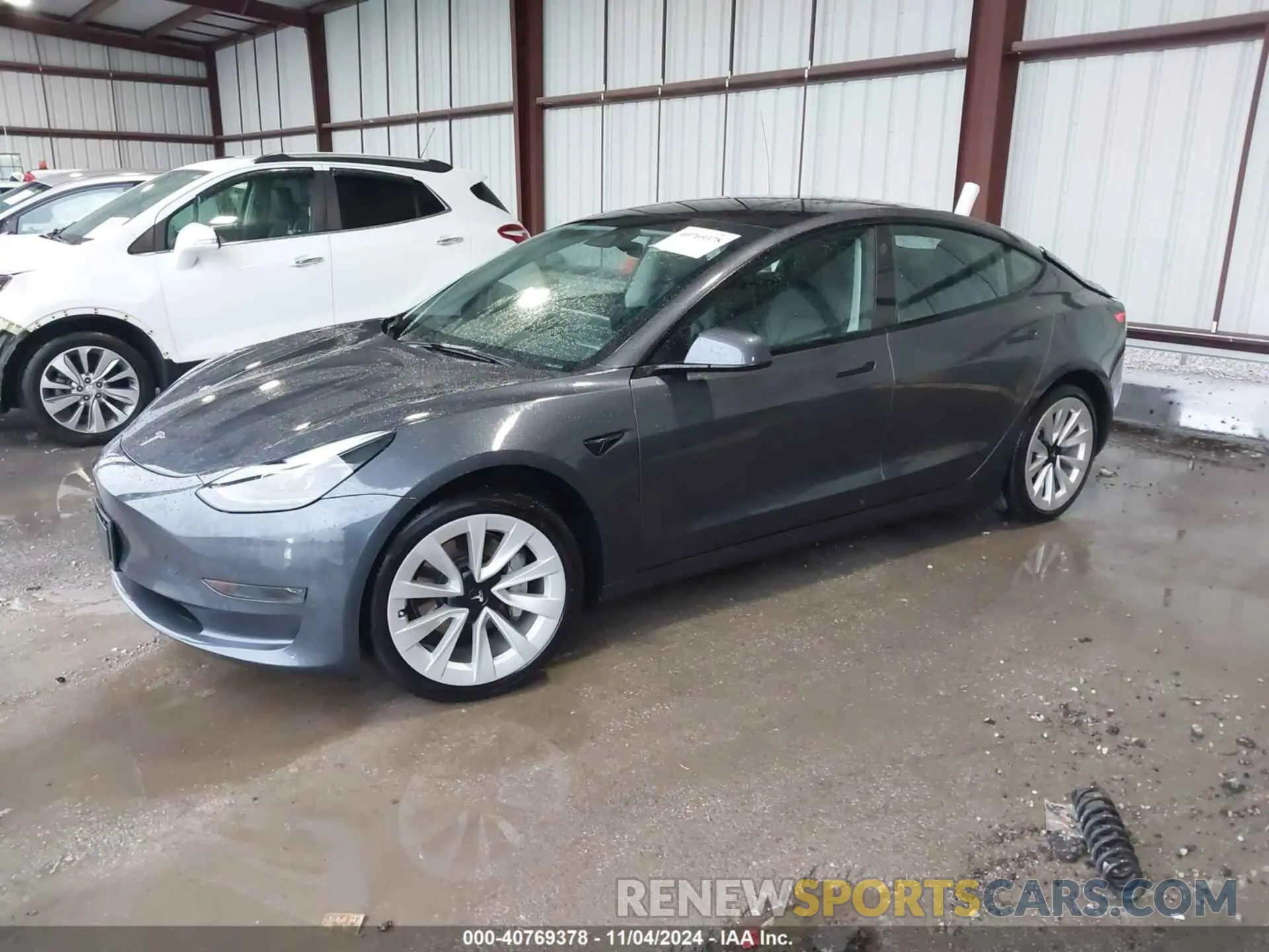 2 fotografías del automóvil dañado 5YJ3E1EA3PF448122 TESLA MODEL 3 2023