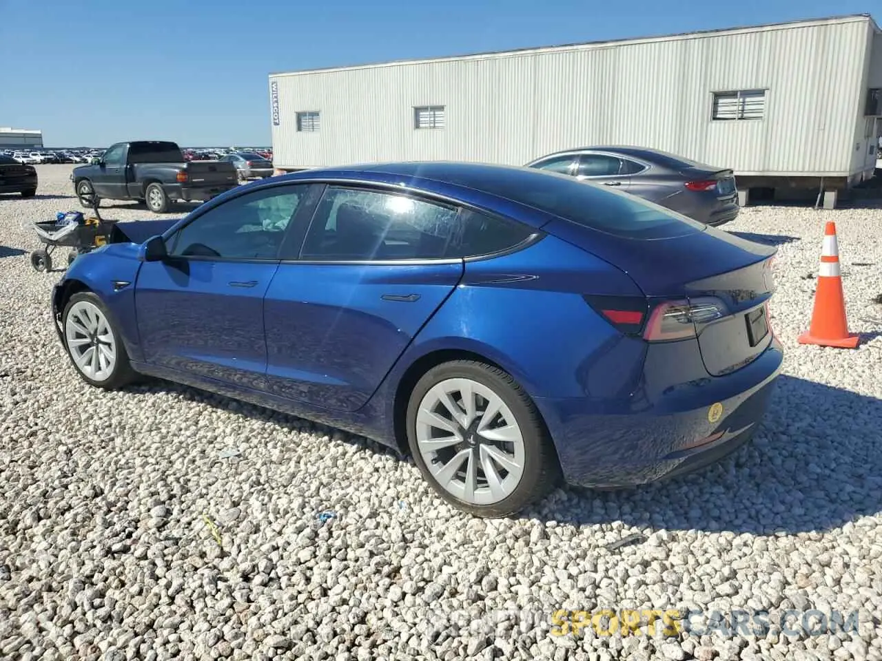 2 fotografías del automóvil dañado 5YJ3E1EA3PF492573 TESLA MODEL 3 2023