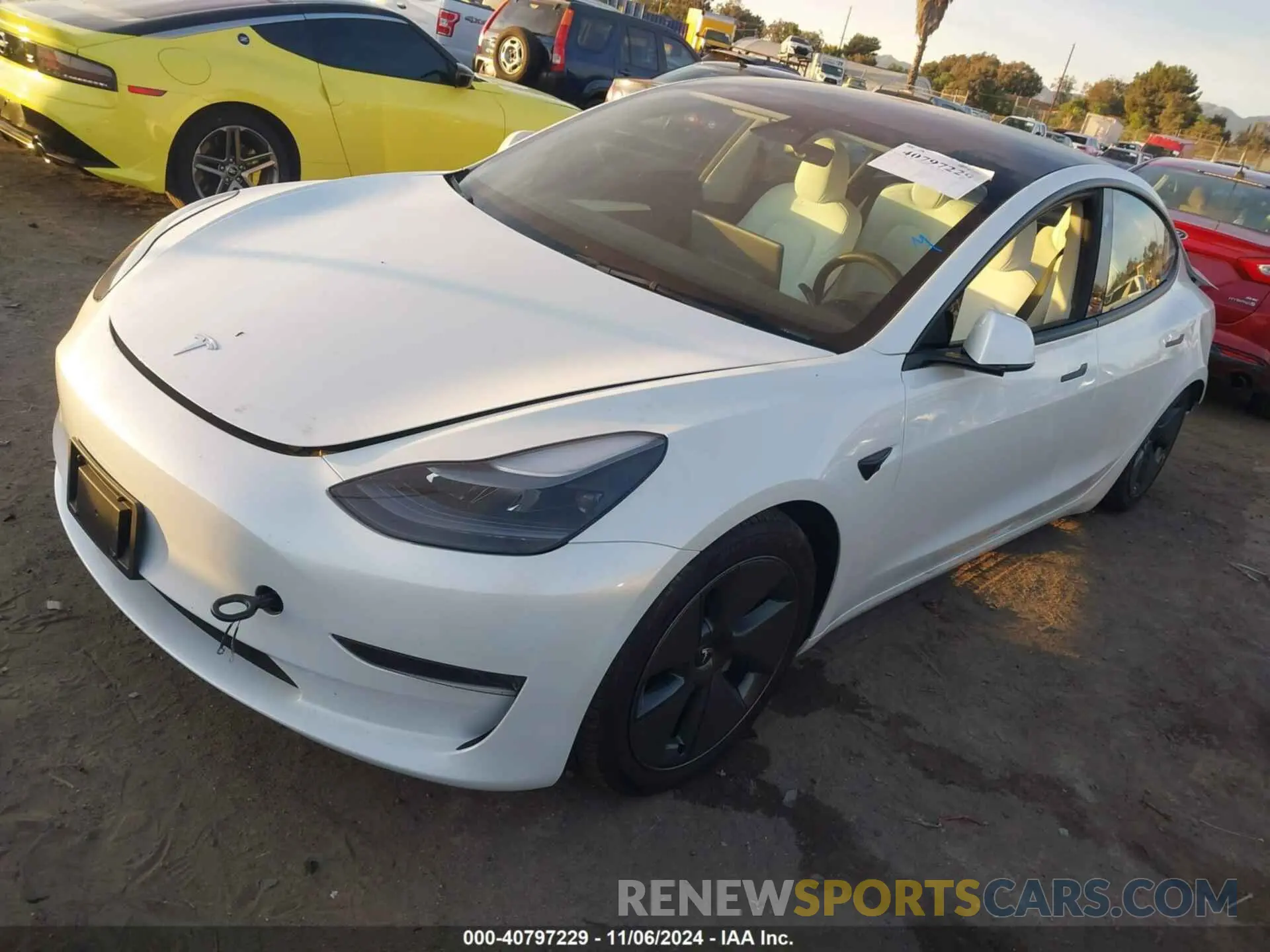 2 fotografías del automóvil dañado 5YJ3E1EA3PF573136 TESLA MODEL 3 2023