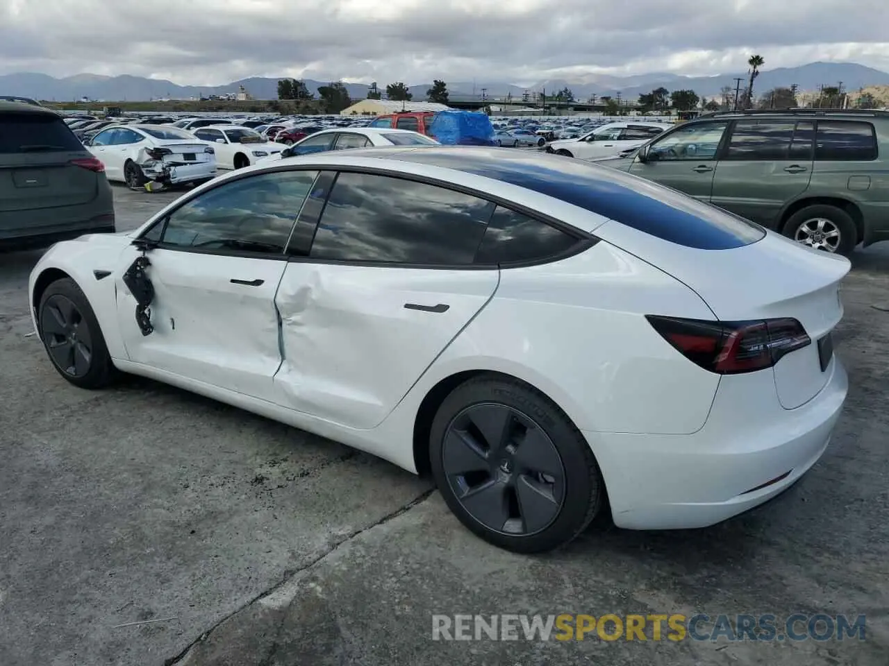 2 fotografías del automóvil dañado 5YJ3E1EA3PF579681 TESLA MODEL 3 2023