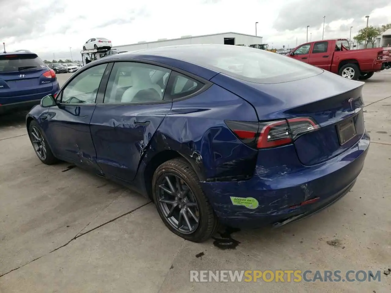 2 fotografías del automóvil dañado 5YJ3E1EA3PF593743 TESLA MODEL 3 2023
