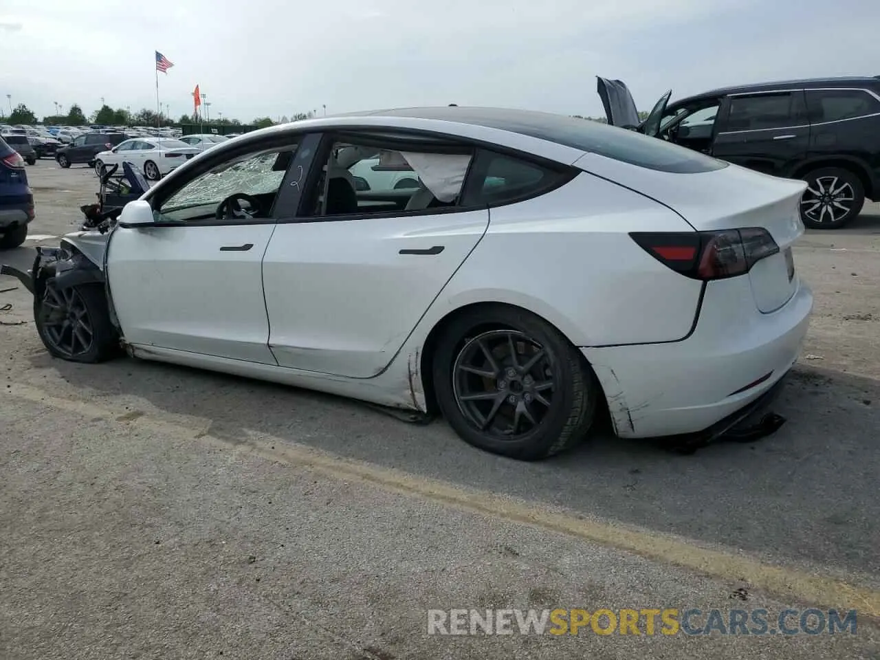 2 fotografías del automóvil dañado 5YJ3E1EA3PF607642 TESLA MODEL 3 2023